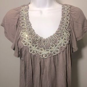 Forever 21 . Beautiful Embroidered and beaded neckline on a flowy top. Size S